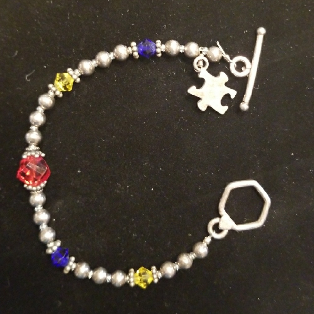 Sterling Silver Puzzle Charm Bracelet